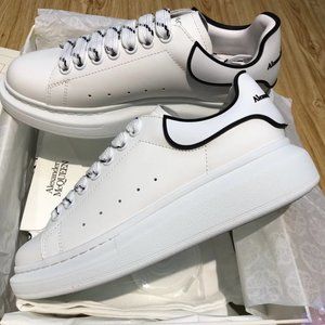 Black edged white men's shoes